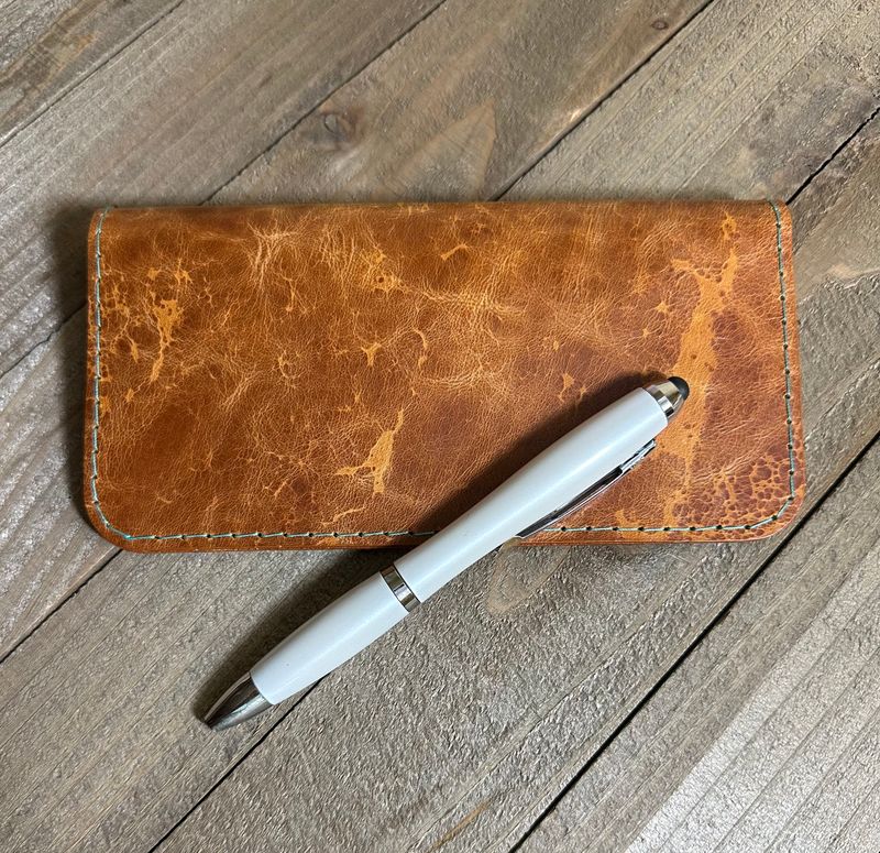 Checkbook and Pen